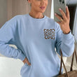 Load image into Gallery viewer, Maris Oversized Embellished Pocket Sweatshirt - Blue

