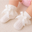 Load image into Gallery viewer, Baby Knitted Frill Bow Ribbon Ankle Socks - Ivory
